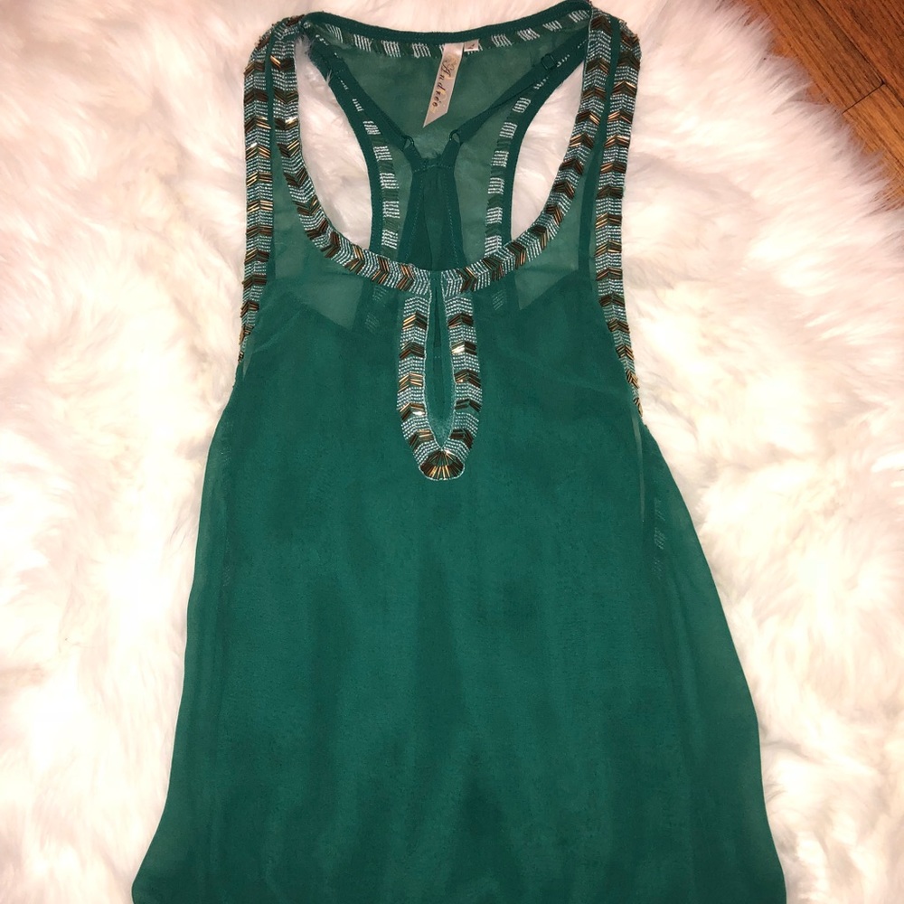 Sleeveless blouse with beaded detail